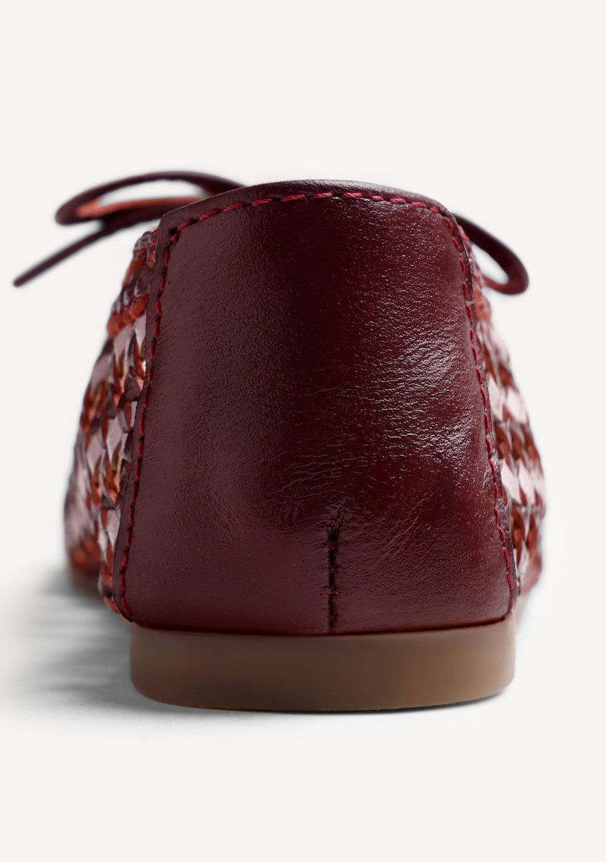 BRAIDED LEATHER BALLET FLATS BY MARÍA G. DE JAIME