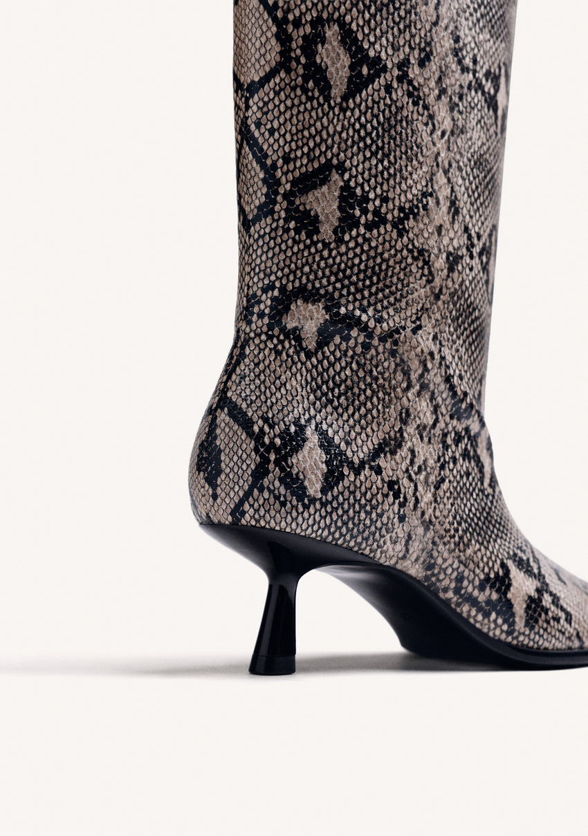 HIGH ANIMAL PRINT KITTEN BOOTS