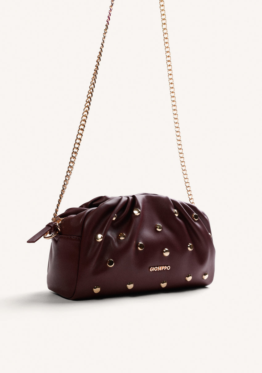 BURGUNDY WRINKLED EFFECT CROSSBODY BAG WITH STUDS